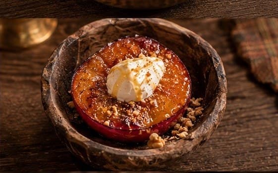 Fire-roasted stone fruit dessert