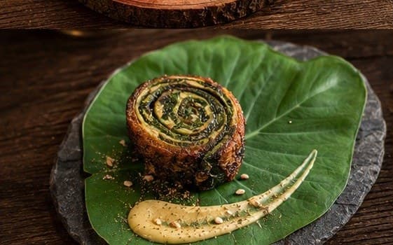 Steamed greens served in a leaf